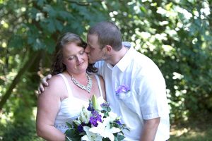 Peter & Mindy - Backyad Wedding Portraits - kiss on the cheek