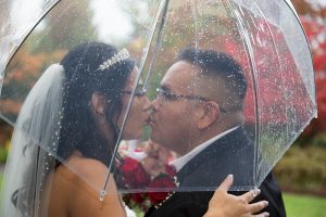 Burnaby Art Gallery Wedding Portraits - Daniel Evangeline - Umbrella Kiss Hide