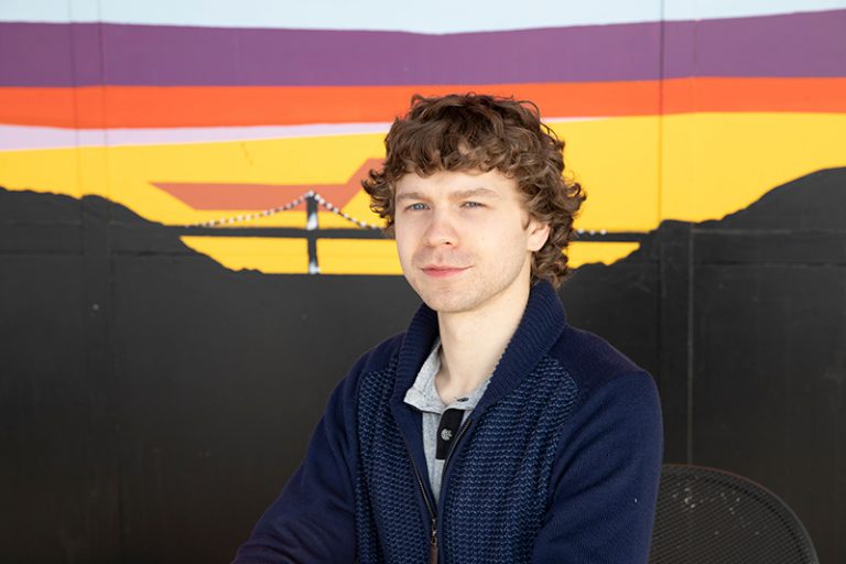online dating profile photo - luke at lonsdale quay mural